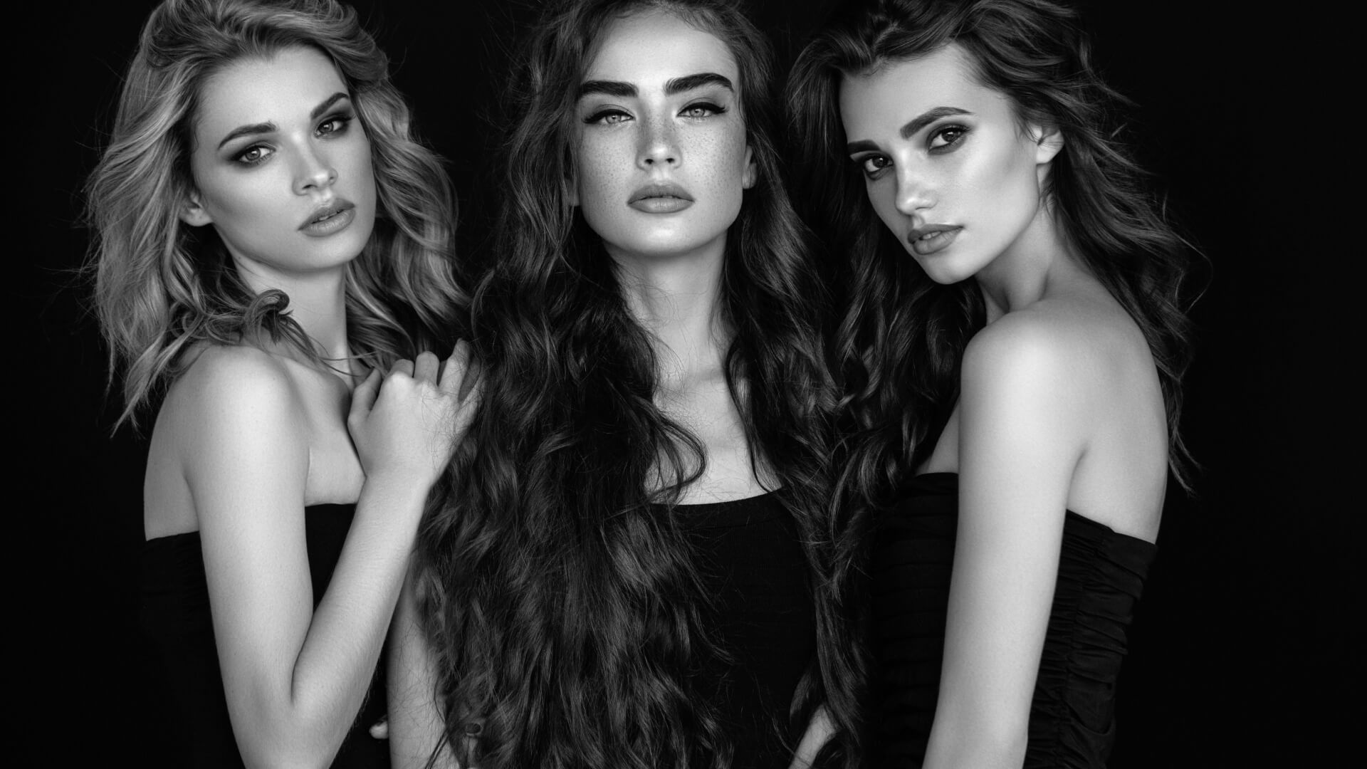 Black and white photo of 3 models