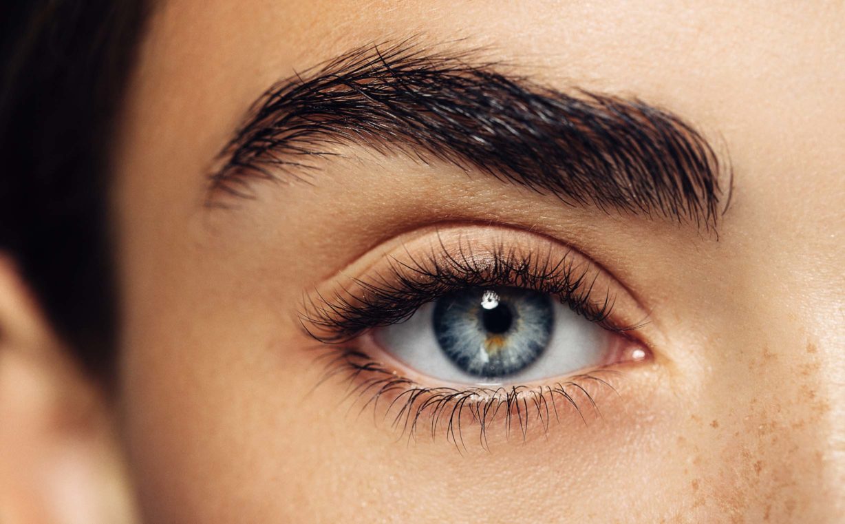 Close up of woman's blue eye