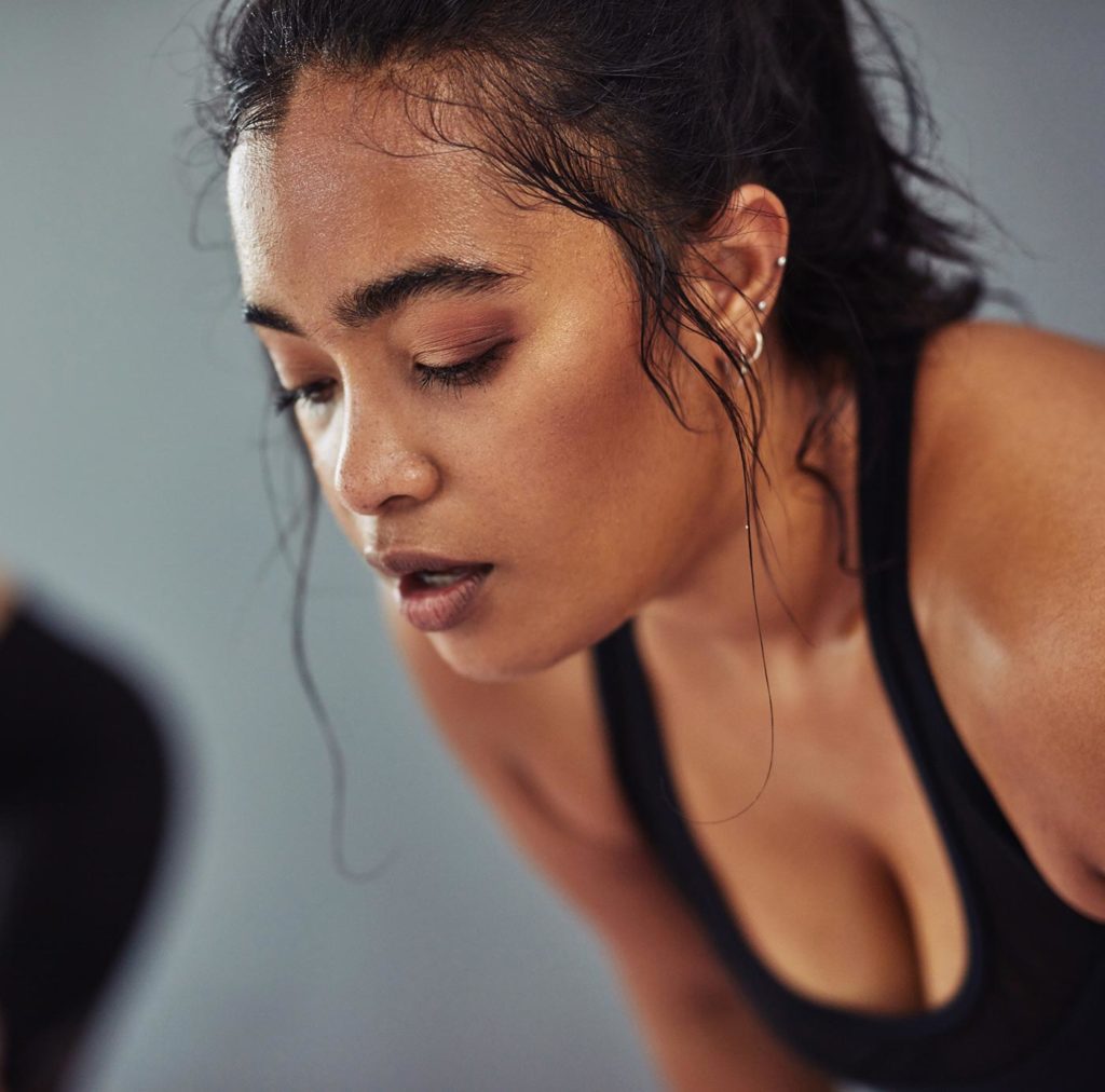 Photo of asian woman sweating